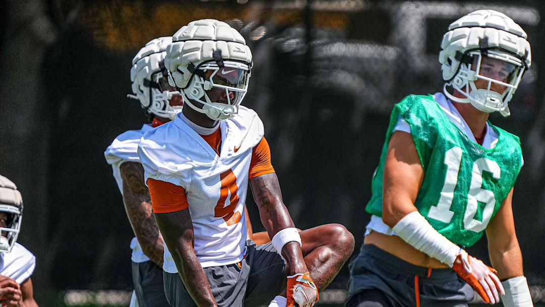 Andrew Mukuba (4) defensive back for the Texas Longhorns stretches at practice at Frank Denius Fields on Thursday, Aug. 1, 2024 in Austin.