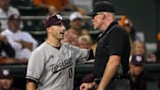 Texas A&M head coach Michael Earley talks to an official during the Lone Star Showdown against Texas at UFCU Disch-Falk Field
