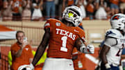 Sep 14, 2024; Austin, Texas, USA; Texas Longhorns receiver Johntay Cook II (1) celebrates a touchdown catch during the game against UTSA at Darrell K Royal–Texas Memorial Stadium. Mandatory Credit: Aaron E. Martinez/USA TODAY Network via Imagn Images