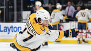 Apr 10, 2025; Salt Lake City, Utah, USA; Nashville Predators right wing Luke Evangelista warms up before a game against the Utah Hockey Club at Delta Center. Mandatory Credit: Rob Gray-Imagn Images
