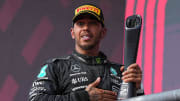 Mercedes AMG Petronas driver Lewis Hamilton holds the second place trophy after a podium finish in the Formula 1 Lenovo United States Grand Prix at Circuit of Americas on Sunday Oct. 22, 2023.