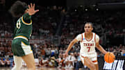 Texas Longhorns guard Jordan Lee (7) dribbles the ball towards the William Mary basket during the first round NCAA playoff game at the Moody Center on Saturday, March 22, 2025.