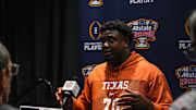 Texas Longhorns offensive lineman Christian Jones (70) speaks to media.