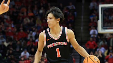 Dec 21, 2024; Newark, New Jersey, USA; Princeton Tigers guard Xaivian Lee (1) dribbles the ball against the Rutgers Scarlet Knights during the second half at Prudential Center. Mandatory Credit: Tom Horak-Imagn Images