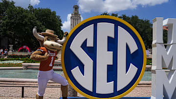 Texas Longhorns mascot Hook 'em poses with the Southeastern Conference logo in front of Littlefield Fountain during the SEC Celebration at the University of Texas at Austin on Sunday, June 30, 2024.