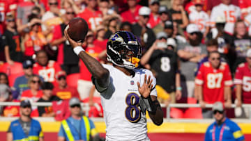Sep 28, 2025; Kansas City, Missouri, USA; Baltimore Ravens quarterback Lamar Jackson (8) throws a pass during the second quarter against the Kansas City Chiefs at GEHA Field at Arrowhead Stadium. Mandatory Credit: Denny Medley-Imagn Images