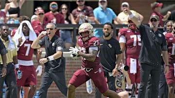 Sep 6, 2025; Tallahassee, Florida, USA; Florida State Seminoles running back Gavin Sawchuck (27) runs down the sideline for a touchdown during the second half against the East Texas A&M Lions at Doak S. Campbell Stadium. Mandatory Credit: Melina Myers-Imagn Images
