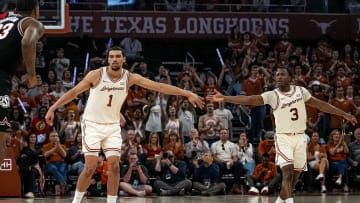 Texas longhorns forward Dylan Disu (1) and guard Max Abmas (3) celebrate a score during the