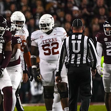 Texas A&M defensive lineman Cashius Howell (18) celebrates a defensive stop during the Lone Star Showdown against the Texas Longhorns at Kyle Field on Saturday, Nov. 30, 2024 in College Station, Texas.
