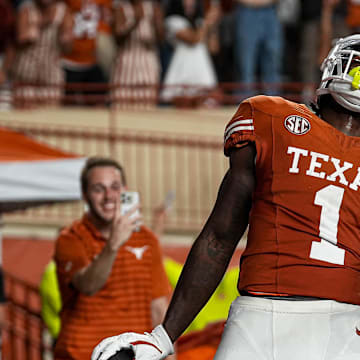 Sep 14, 2024; Austin, Texas, USA; Texas Longhorns receiver Johntay Cook II (1) celebrates a touchdown catch during the game against UTSA at Darrell K Royal–Texas Memorial Stadium. Mandatory Credit: Aaron E. Martinez/USA TODAY Network via Imagn Images