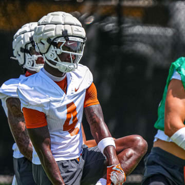 Andrew Mukuba (4) defensive back for the Texas Longhorns stretches at practice at Frank Denius Fields on Thursday, Aug. 1, 2024 in Austin.