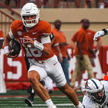 Texas Longhorns quarterback Arch Manning (16) runs the ball during the game against UTSA at Darrell K Royal-Texas Memorial Stadium in Austin Saturday, Sept. 14, 2024.