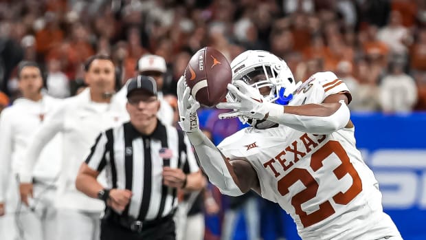 Texas Longhorns running back Jaydon Blue (23) makes a catch for a first down during the Sugar Bowl College Football Playoff  