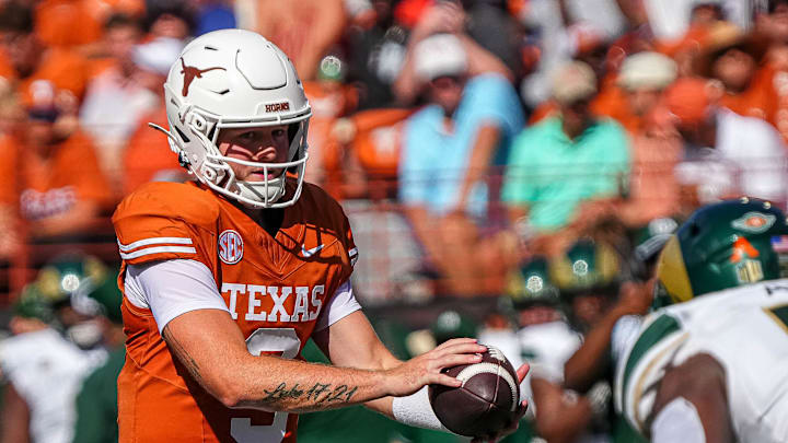 Texas Longhorns quarterback Quinn Ewers (3) snaps the ball during the game against Colorado State at Darrell K Royal-Texas Memorial Stadium in Austin Saturday, Aug. 31, 2024.