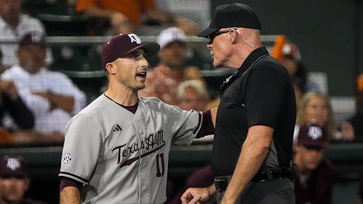 Texas A&M head coach Michael Earley talks to an official during the Lone Star Showdown against Texas at UFCU Disch-Falk Field on Friday, April 25, 2025.