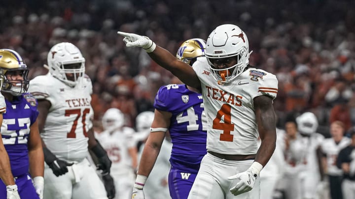 Texas Longhorns running back CJ Baxter (4) celebrates a first down during the Sugar Bowl College Football Playoff  semifinals game against the Washington Huskies at the Caesars Superdome on Monday, Jan. 1, 2024 in New Orleans, Louisiana.