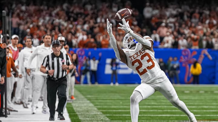 Texas Longhorns running back Jaydon Blue (23) makes a catch for a first down during the Sugar Bowl College Football Playoff  semifinals game against the Washington Huskies at the Caesars Superdome on Monday, Jan. 1, 2024 in New Orleans, Louisiana.