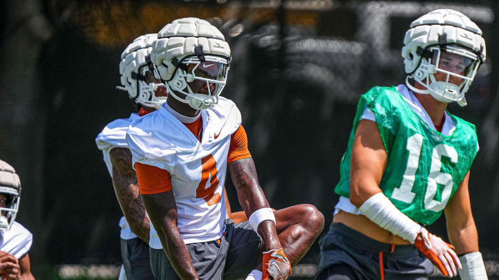 Andrew Mukuba (4) defensive back for the Texas Longhorns stretches at practice at Frank Denius Fields on Thursday, Aug. 1, 2024 in Austin.