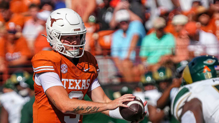 Aug 31, 2024; Austin, Texas, USA; Texas Longhorns quarterback Quinn Ewers (3) takes the snap against Colorado State at Darrell K Royal-Texas Memorial Stadium. Mandatory Credit: Aaron E. Martinez/American-Statesman-USA TODAY Sports