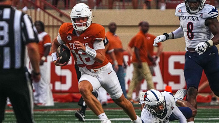 Texas Longhorns quarterback Arch Manning (16) runs the ball during the game against UTSA at Darrell K Royal-Texas Memorial Stadium in Austin Saturday, Sept. 14, 2024.