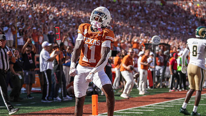 Texas Longhorns receiver Silas Bolden (11) celebrates a touchdown.