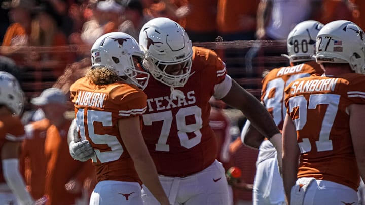 Texas Longhorns offensive lineman Kelvin Banks Jr. (78) hugs kicker Bert Auburn (45) after a field goal against Kansas State at Royal-Memorial Stadium on Saturday, Nov. 4, 2023 in Austin.