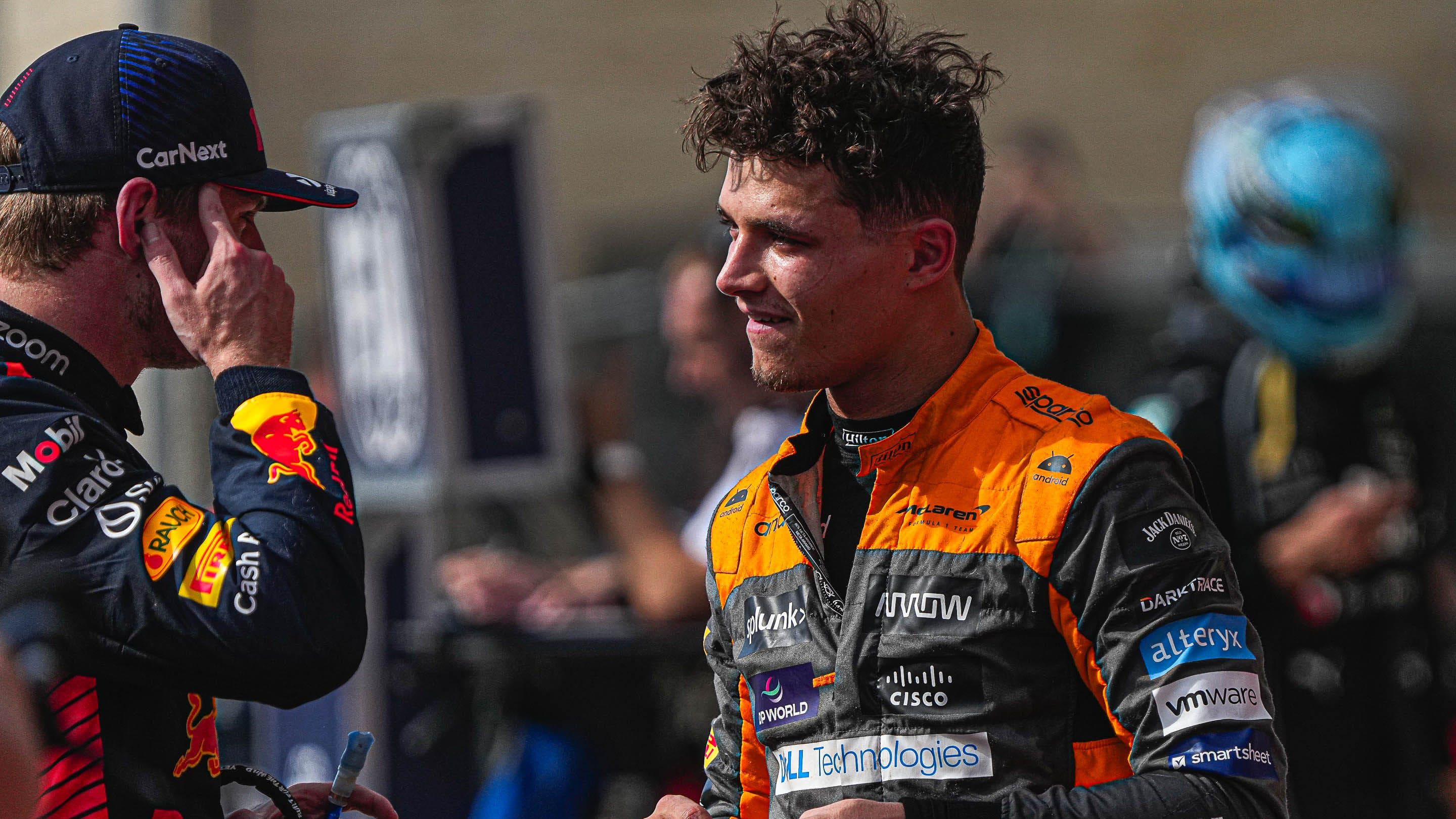 McLaren driver Lando Norris, right, speaks to Oracle Red Bull Racing driver Max Verstappen after the