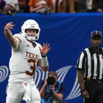 Texas Longhorns quarterback Quinn Ewers (3) throws a pass during the Sugar Bowl College Football Playoff semifinals game against the Washington Huskies at the Caesars Superdome on Monday, Jan. 1, 2024 in New Orleans, Louisiana.