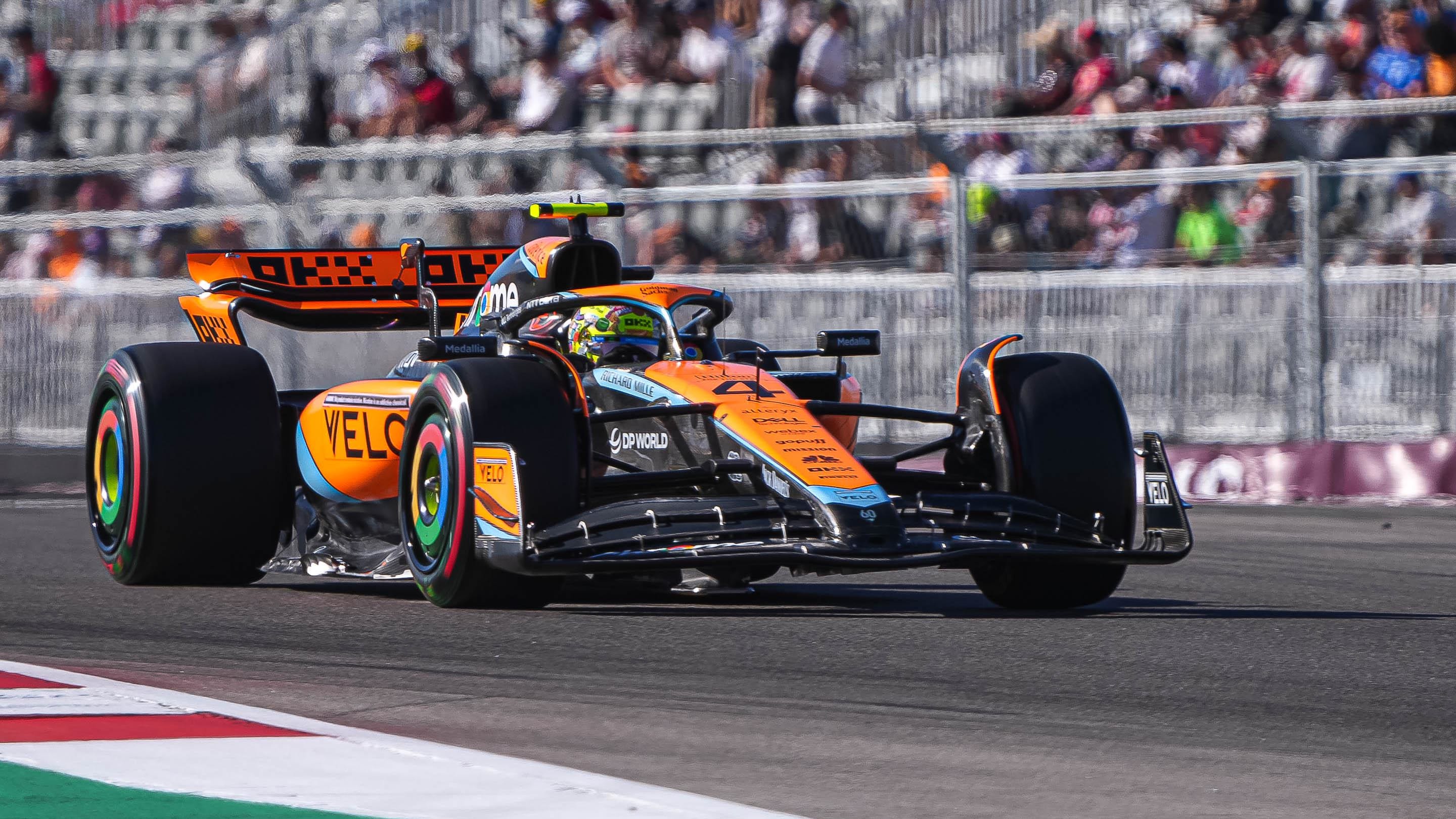 McLaren driver Lando Norris exits turn six during qualifying at Circuit of Americas on Friday Oct.