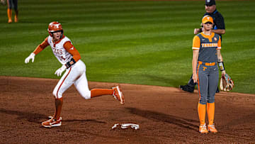 Texas Longhorns catcher Reese Atwood (14) rounds second base during the game against Tennessee at Red & Charline McCombs Field on Friday, April 11, 2025, in Austin.