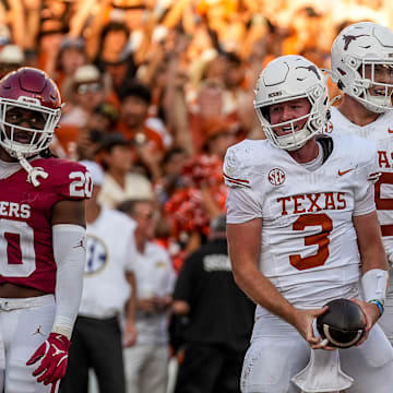 Texas Longhorns quarterback Quinn Ewers (3) celebrates a touchdown run during the Red River Rivalry game against Oklahoma at the Cotton Bowl on Saturday, Oct. 12, 2024 in Dallas, Texas.