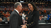 Texas Longhorns head coach Vic Schaefer meets Illinois head coach Shauna Green ahead of the second round NCAA playoff game against Illinois at the Moody Center on Monday, March 24, 2025.