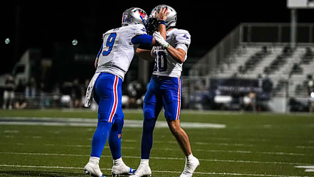 Westlake wideout Cal Livengood (10) celebrates a TD with QB Rees Wise (9) against Steele at in Schertz, Texas on Friday, Sept