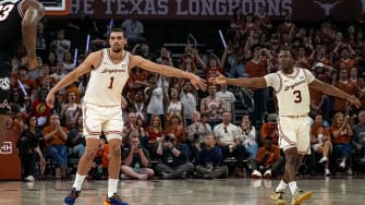 Texas longhorns forward Dylan Disu (1) and guard Max Abmas (3) celebrate a score during the basketball game against Oklahoma State at the Moody Center on Saturday, Mar. 2, 2024 in Austin.