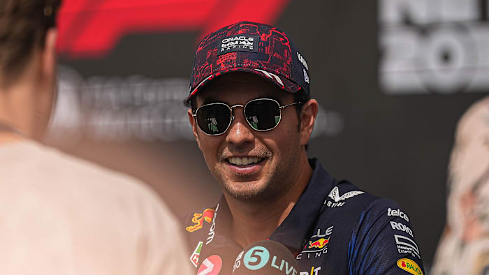 Oracle Red Bull driver Sergio Perez is interviewed in the paddock area at Circuit of Americas on