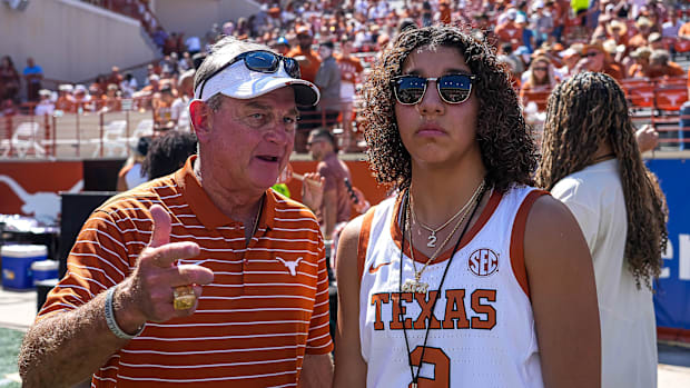 Aaliyah Chavez and Texas Longhorns basketball coach Vic Schaefer 