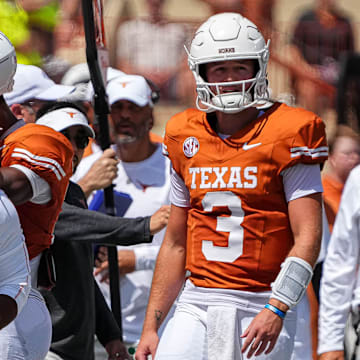 Texas Longhorns quarterback Quinn Ewers (3) walks off the feild after an interception during the game against Colorado State at Darrell K Royal-Texas Memorial Stadium in Austin Saturday, Aug. 31, 2024.