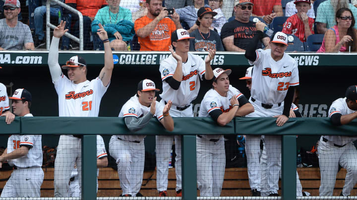 Jun 22, 2018; Omaha, NE, USA; The Oregon State Beavers bench cheer a rally in the second inning against the Mississippi State Bulldogs in the College World Series at TD Ameritrade Park. Mandatory Credit: Steven Branscombe-USA TODAY Sports