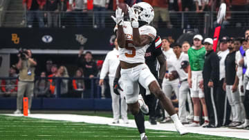 Texas Longhorns wide receiver Adonai Mitchell (5) makes a catch for a first down during the Big 12