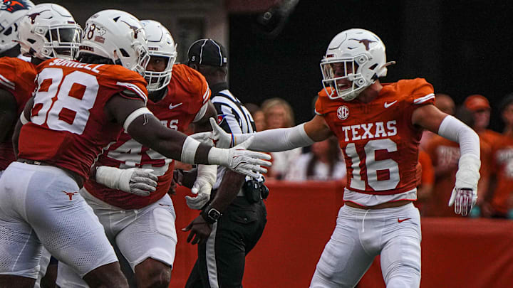 Sep 14, 2024; Austin, Texas, USA; Texas Longhorns defensive back Michael Taaffe (16) and edge Barryn Sorrell (88) celebrate a fourth down stop during the game against UTSA at Darrell K Royal–Texas Memorial Stadium.