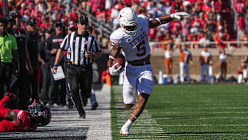 Sep 24, 2022; Lubbock, Texas, USA; Texas Longhorns running back Bijan Robinson (5) runs the ball down the sideline against the Texas Tech Red Raiders during a game at Jones AT&T Stadium.