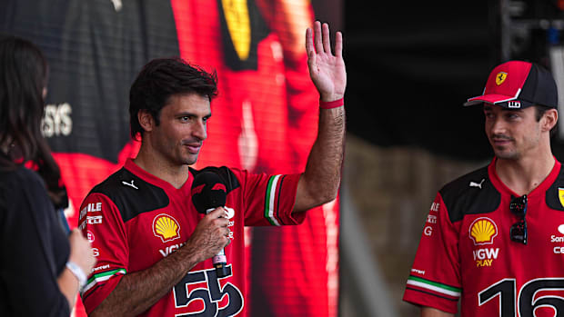 Scuderia Ferrari driver Carlos Sainz waves to the crowd during driver engagements at the Germania