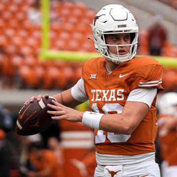 Texas Longhorns quarterback Arch Manning (16) throws a pass during warmups ahead of the game against Kansas State at Royal-Memorial Stadium on Saturday, Nov. 4, 2023 in Austin.