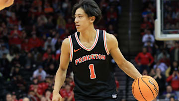 Dec 21, 2024; Newark, New Jersey, USA; Princeton Tigers guard Xaivian Lee (1) dribbles the ball against the Rutgers Scarlet Knights during the second half at Prudential Center. Mandatory Credit: Tom Horak-Imagn Images