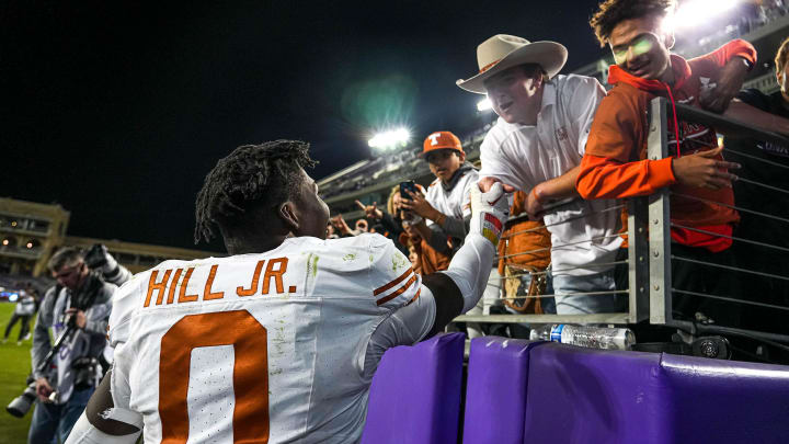 Texas Longhorns linebacker Anthony Hill Jr. (0) celebrates the 29-26 win over TCU with Texas fans at Amon G. Carter Stadium on Saturday, Nov. 11, 2023 in Fort Worth, Texas.