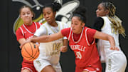 Greenville guard Ava Owens (10) grabs a loose ball.