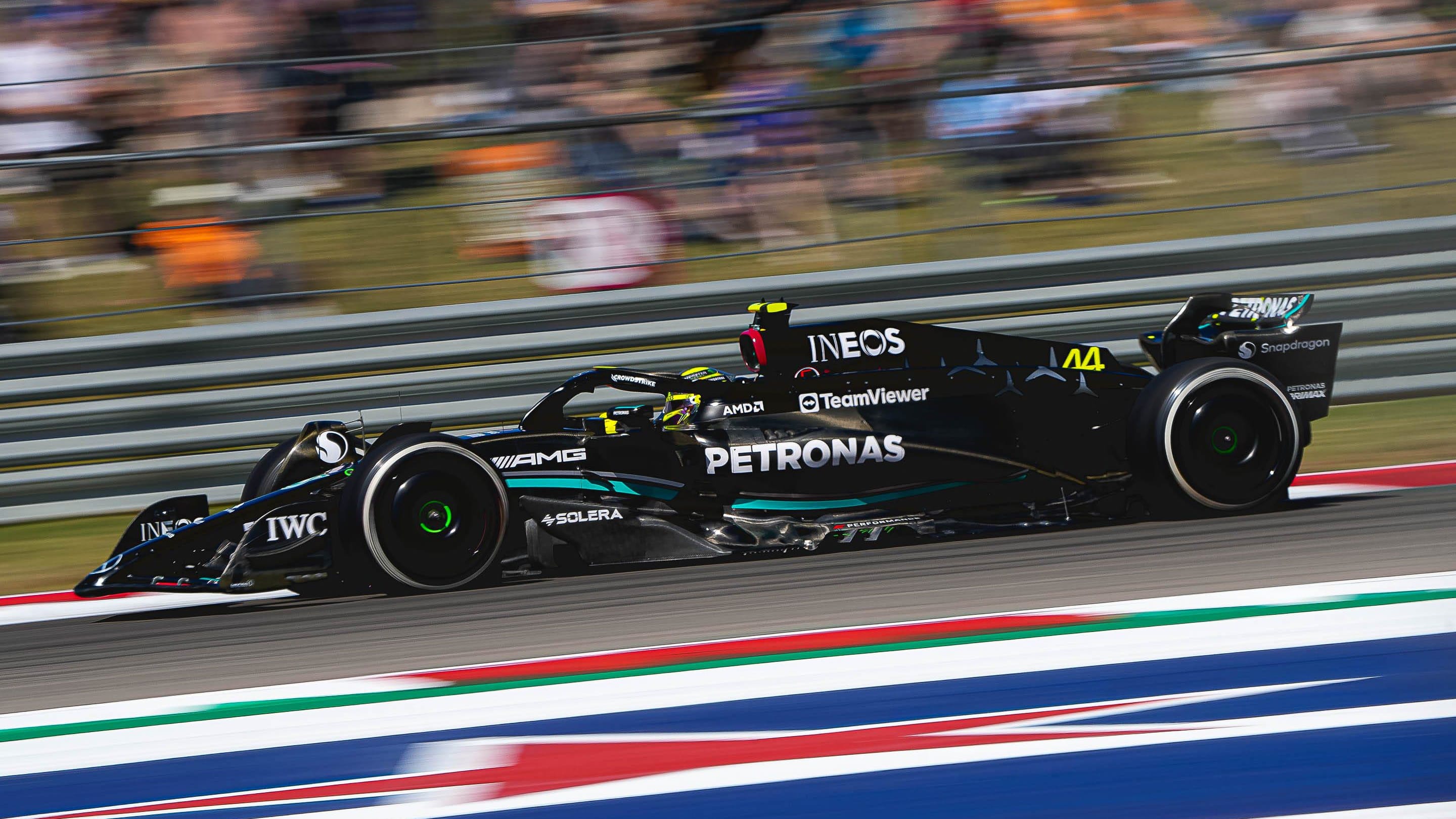 Mercedes AMG Petronas driver Lewis Hamilton rounds turn 17 during the first F1 practice at Circuit