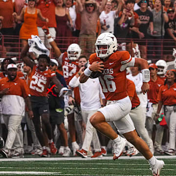 Texas Longhorns quarterback Arch Manning (16) runs the ball during the game against UTSA at Darrell K Royal-Texas Memorial Stadium in Austin Saturday, Sept. 14, 2024.