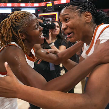 Texas Longhorns guards Madison Booker, Bryanna Preston, and Rori Harmon celebrate the 65-58 win over LSU at the Moody Center on Sunday, Feb. 16, 2025.