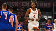 Texas Longhorns forward Jamie Vinson (4) runs towards his team basket during the game against Houston Christian at the Moody Center on Friday, Nov. 8, 2024 in Austin.